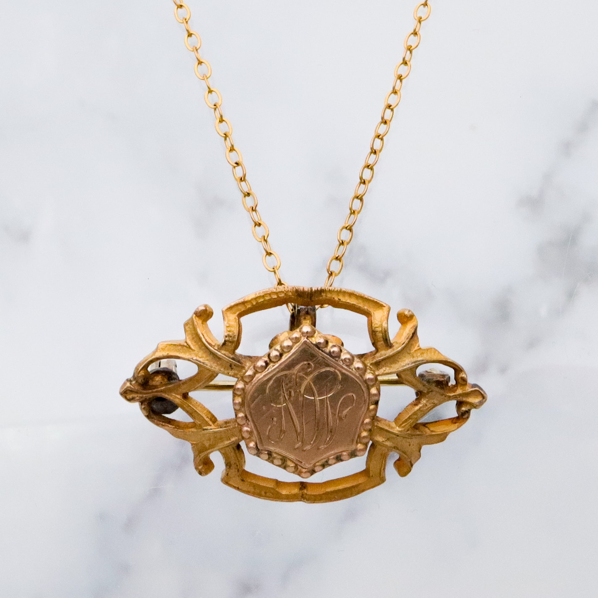 Antique Art Deco gilt metal & gold filled watch clip brooch with "MN" mono shield